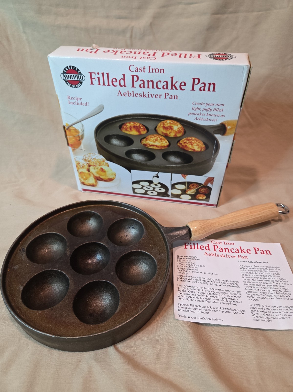 Norpro Cast Iron Aebleskiver Pan with removable Wood Handle Norpro Cast Iron Aebleskiver Pan with removable Wood Handle