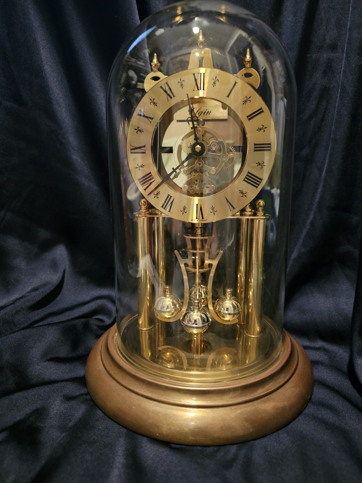 Vintage Elgin 400 day Anniversary torsion clock with winding key.  Siegfried...