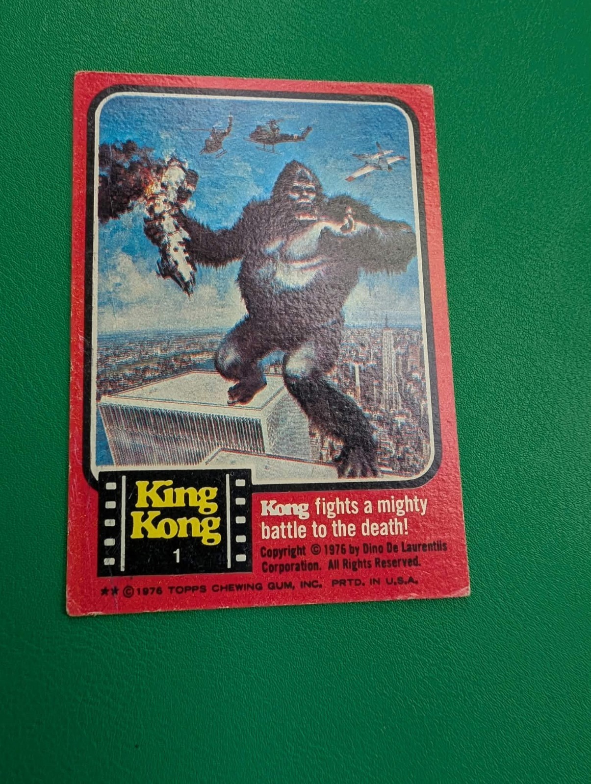 Kong Fights a Mighty Battle to the Death - 1976 Topps King Kong #1
