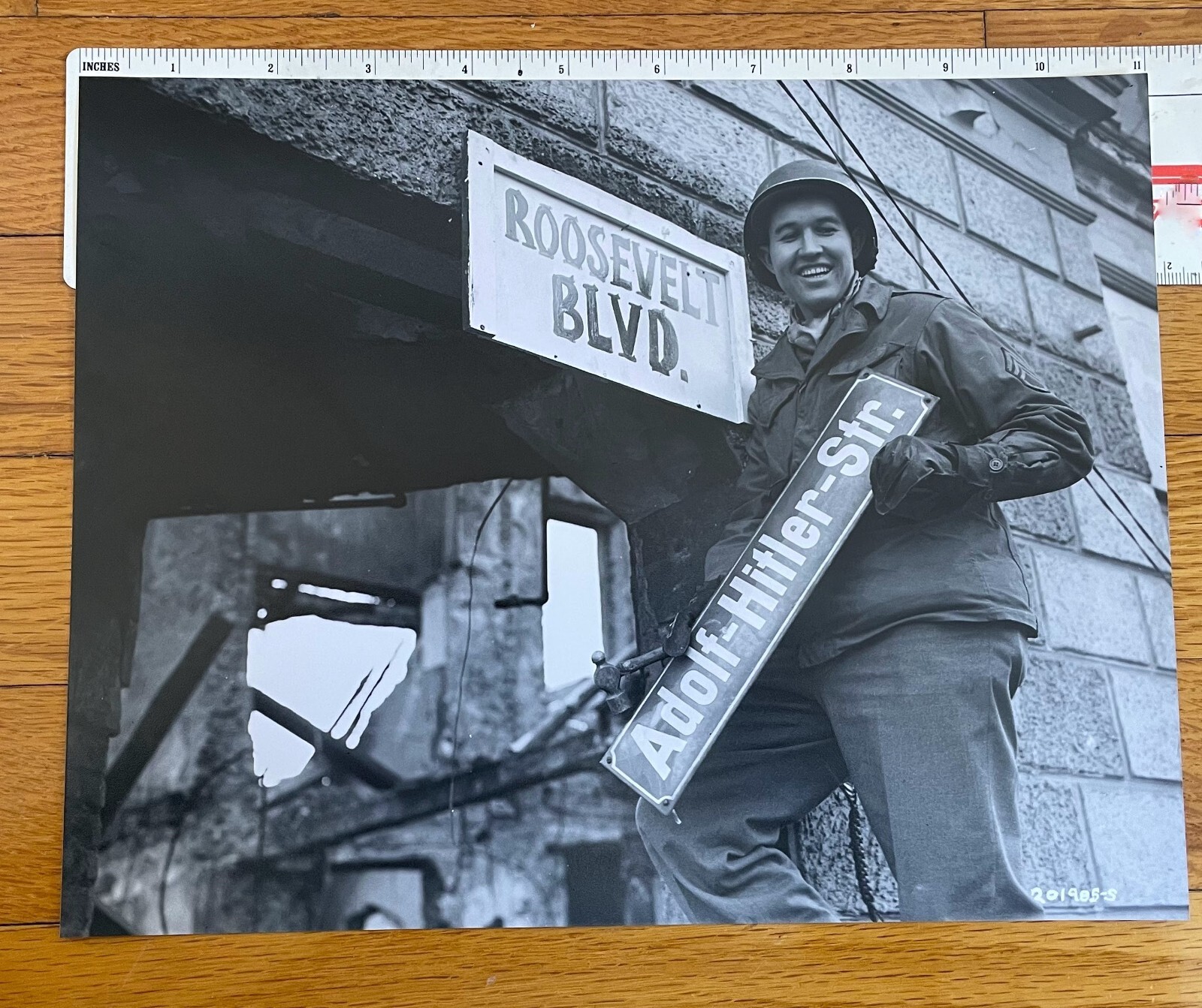American Soldier replacing a Hitler street sign 8.5x11 WWII Photo