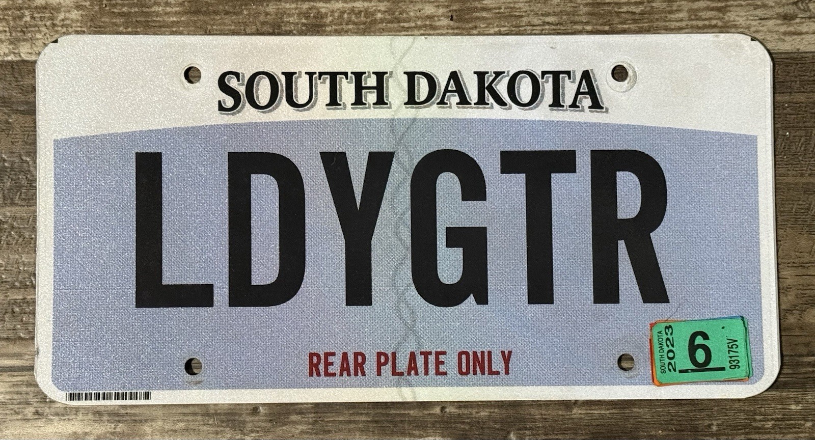 Expired South Dakota Vanity License Plate- Rear Plate Only-Lady Gator (Florida)