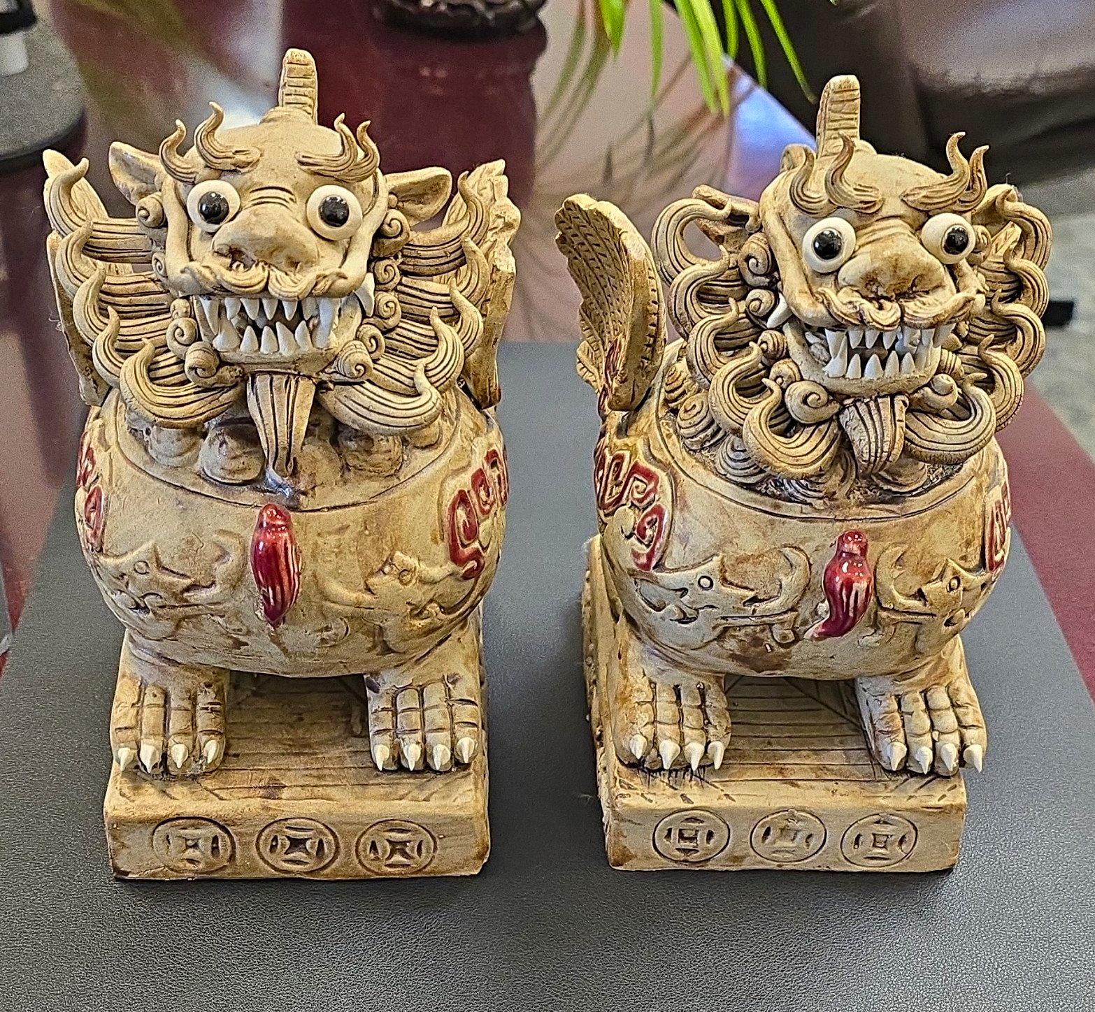 Pair of Chinese Ceramic Foo Dog Guardian Lion Statues Beige Red Accents