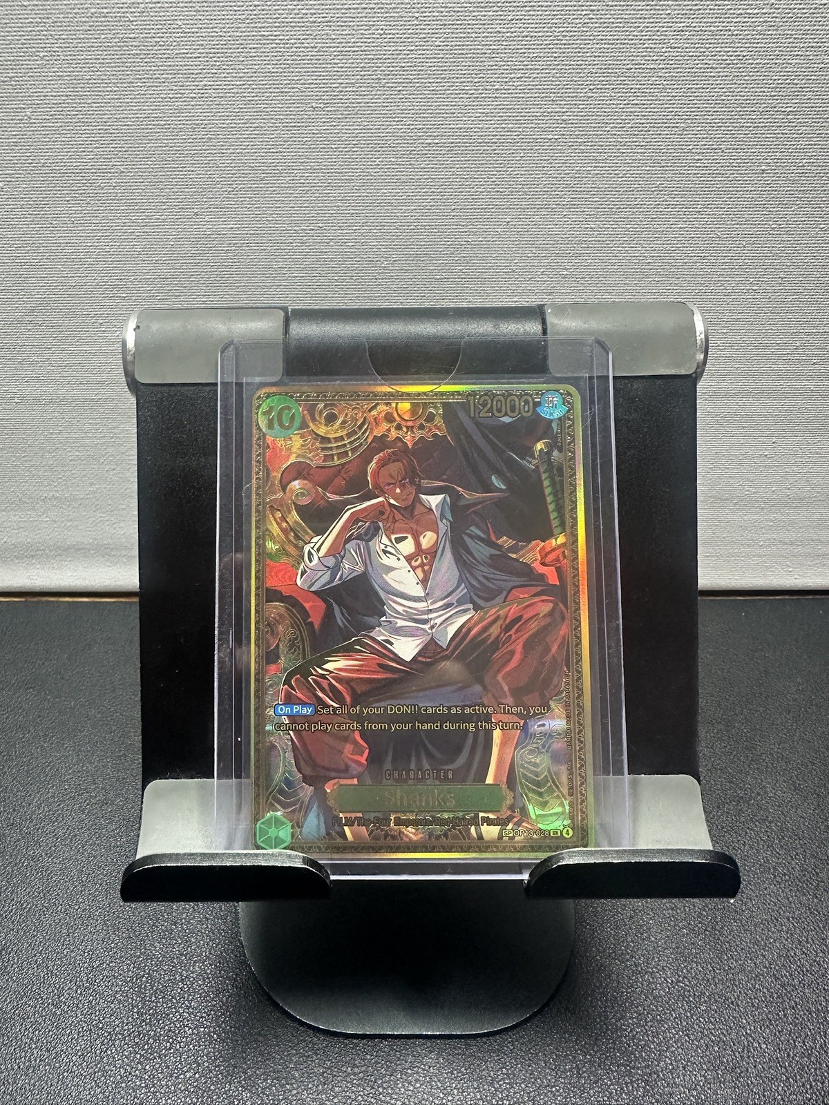 One Piece OP-17 The World’s Strongest Warriors Shanks Gold SP OP17 - 028 SR ENG One Piece OP-17 The World’s Strongest Warriors Shanks Gold SP OP17 - 028 SR ENG