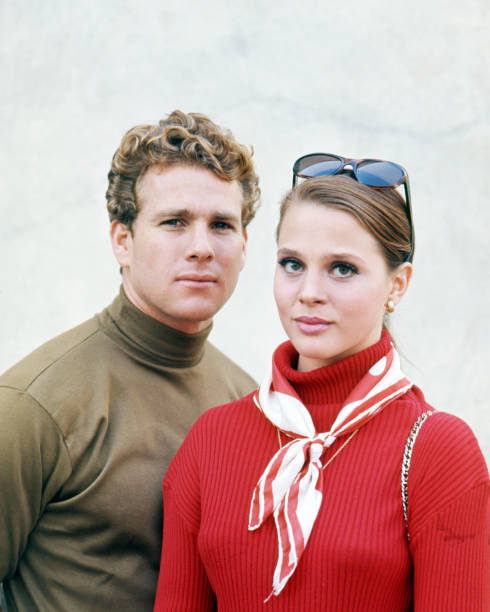 Ryan O\'Neal and Leigh Taylor-Young, circa 1966. They play Rodney H- Old Photo Ryan O\'Neal and Leigh Taylor-Young, circa 1966. They play Rodney H- Old Photo