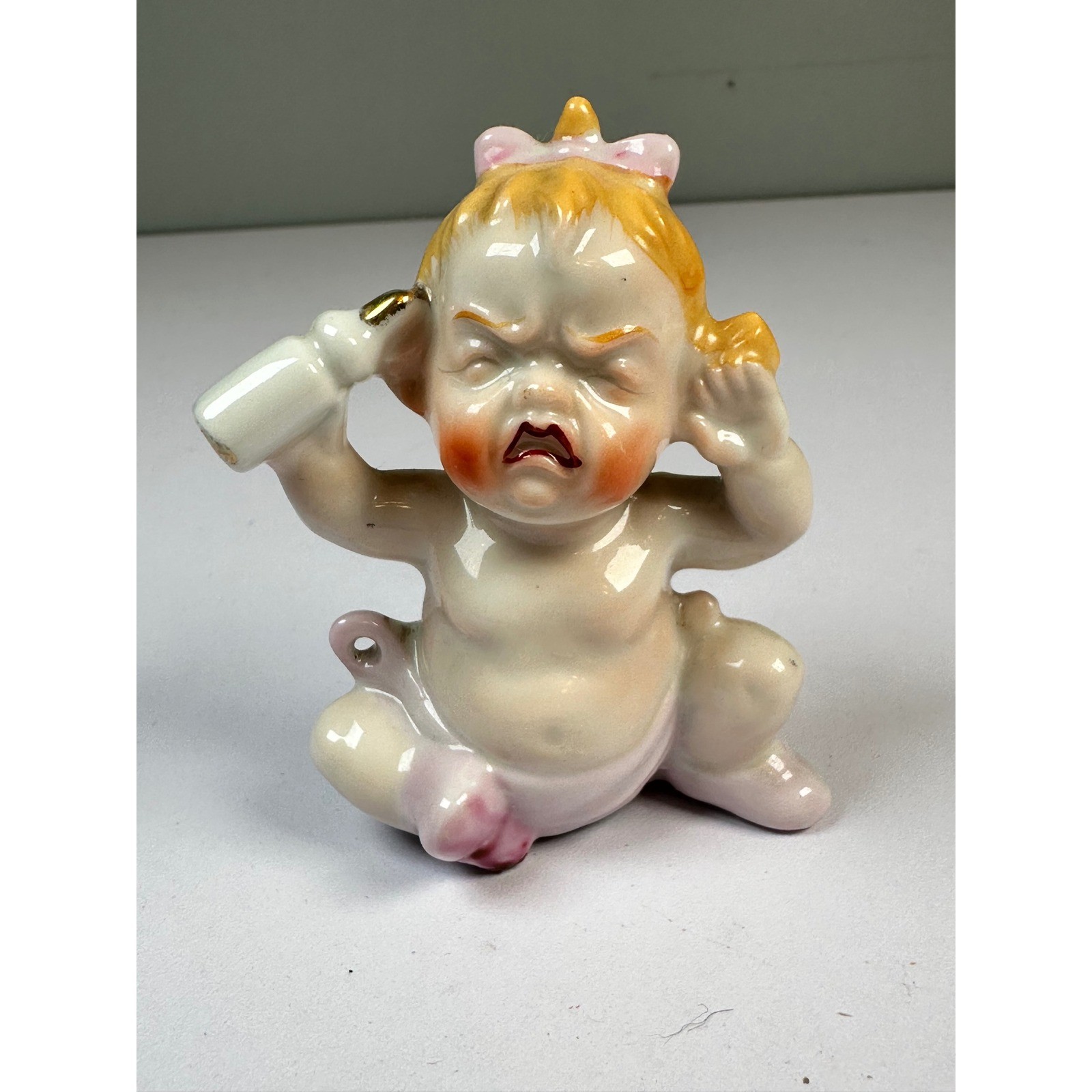 Vintage Crying Baby Girl Figurine Porcelain Japan Pink Bow Bottle Kitsch Decor Vintage Crying Baby Girl Figurine Porcelain Japan Pink Bow Bottle Kitsch Decor