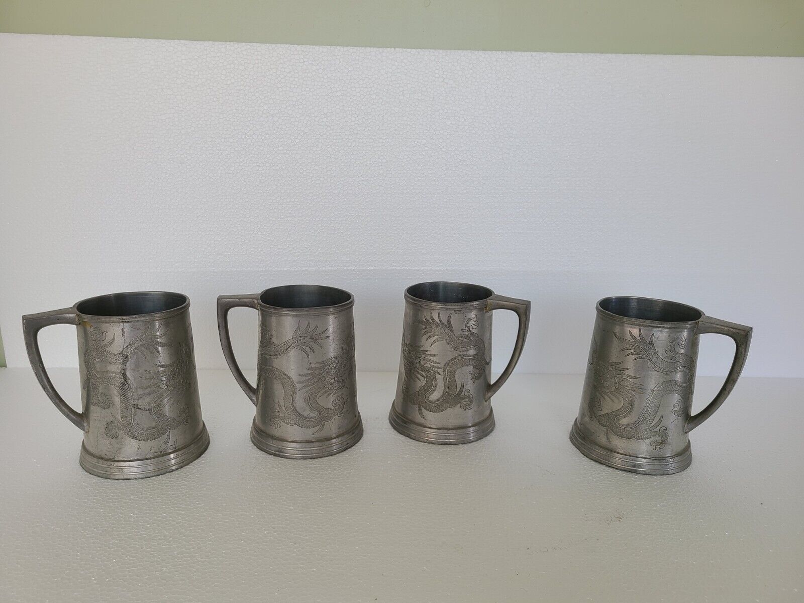 Lot Of 4 Etched Pewter Dragon Tankard Mugs