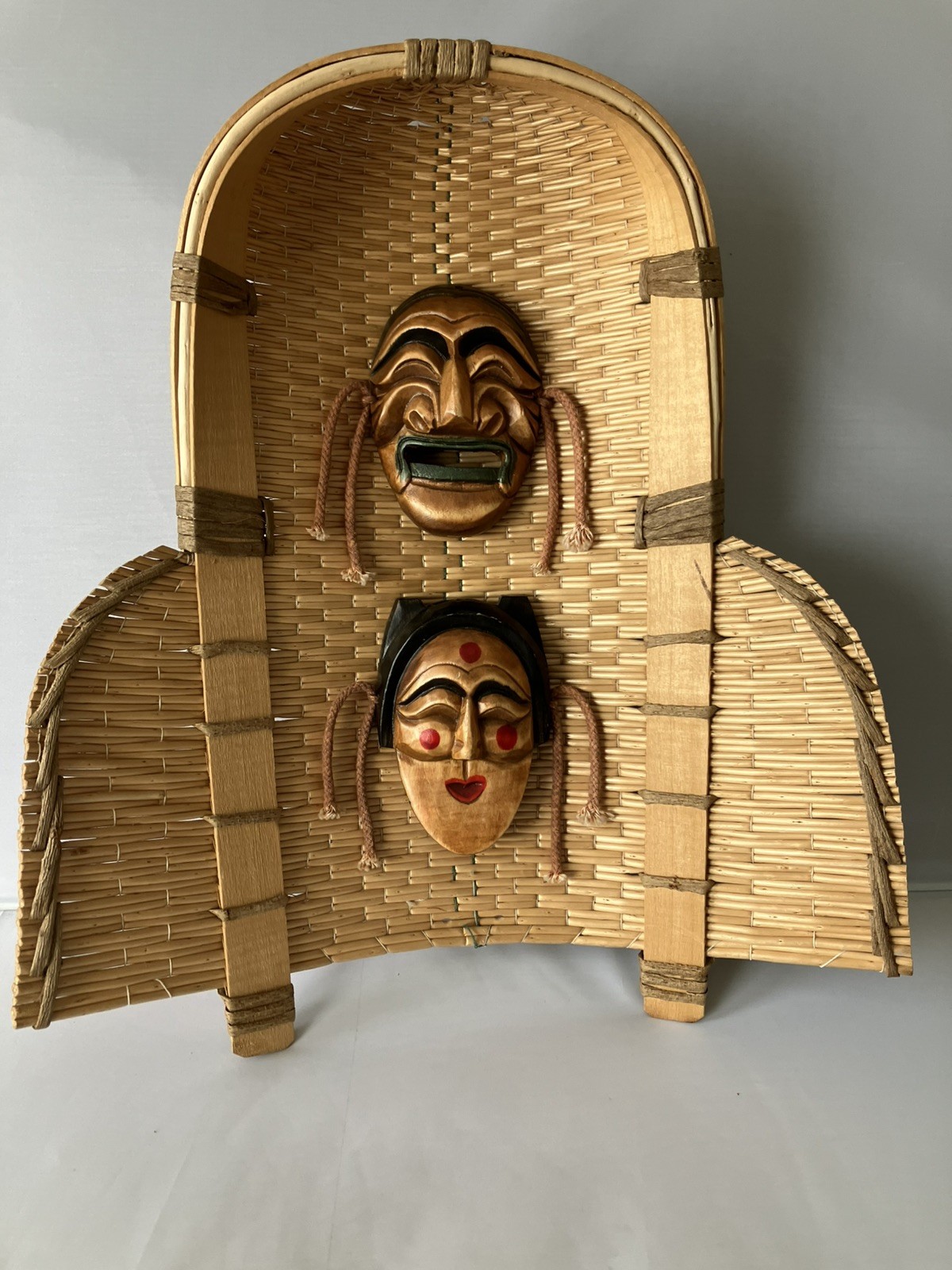 Vintage Korean Hahoe Masks on Bamboo Winnowing Basket Vintage Korean Hahoe Masks on Bamboo Winnowing Basket