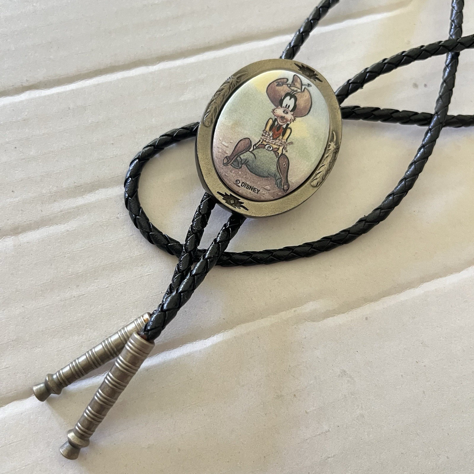 Vintage Disney cowboy Goofy leather porcelain bolo tie Vintage Disney cowboy Goofy leather porcelain bolo tie