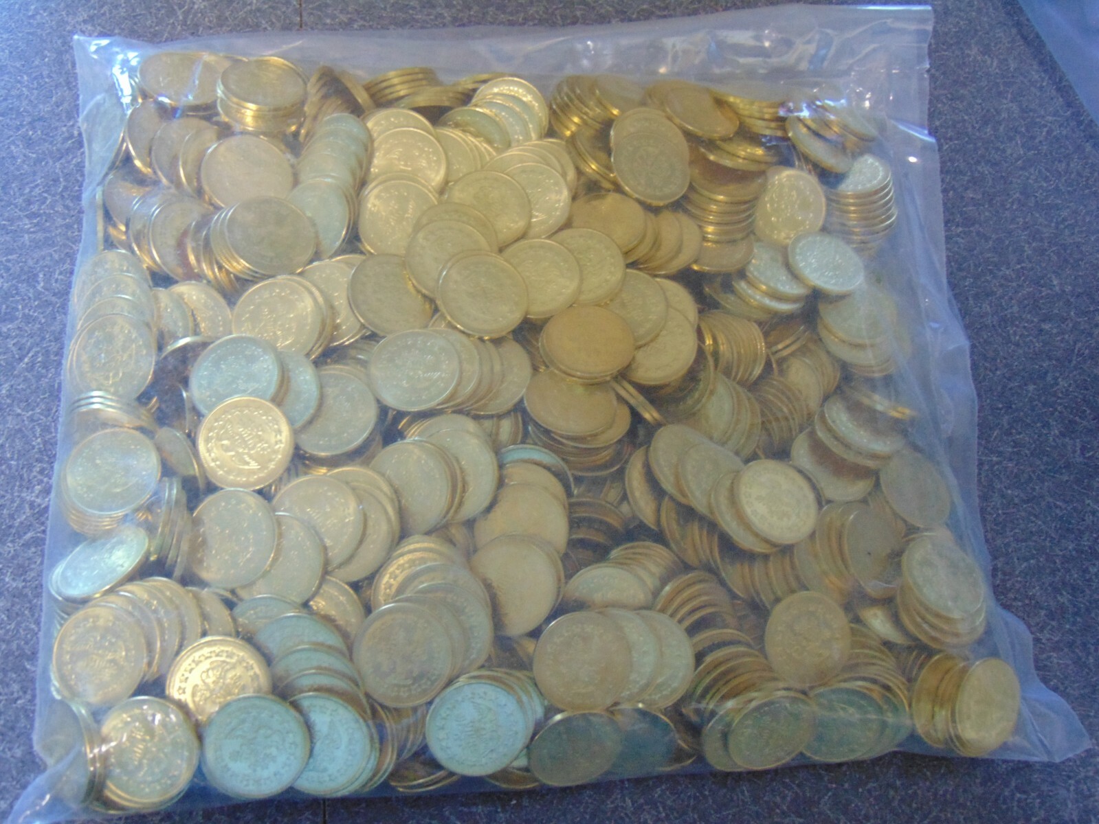 New 1000 Count Bag of Quarter Pusher Slide Tokens. Use on Token Pushers. New 1000 Count Bag of Quarter Pusher Slide Tokens. Use on Token Pushers.