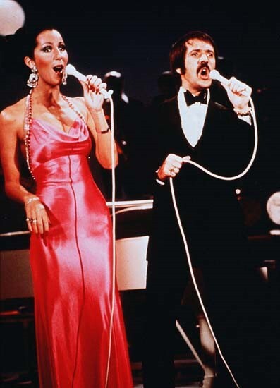 Sonny and Cher in evening dress singing together from their TV series 8x10 photo Sonny and Cher in evening dress singing together from their TV series 8x10 photo