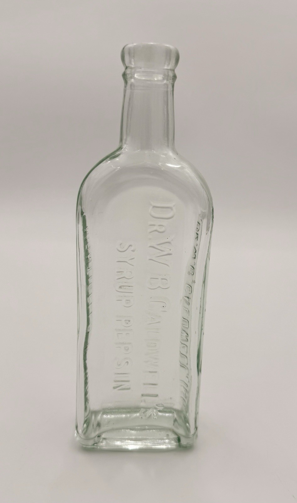 Antique D W B Caldwell Syrup Pepsin Embossed Glass Bottle No Cap