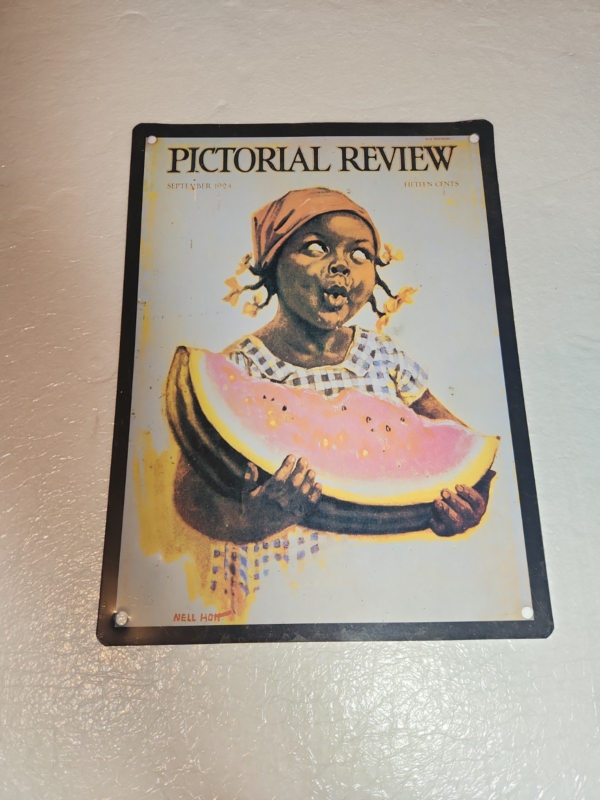 Vintage 1924 Pictorial Review Metal Sign 'Girl Eating Watermelon' Vintage 1924 Pictorial Review Metal Sign 'Girl Eating Watermelon'