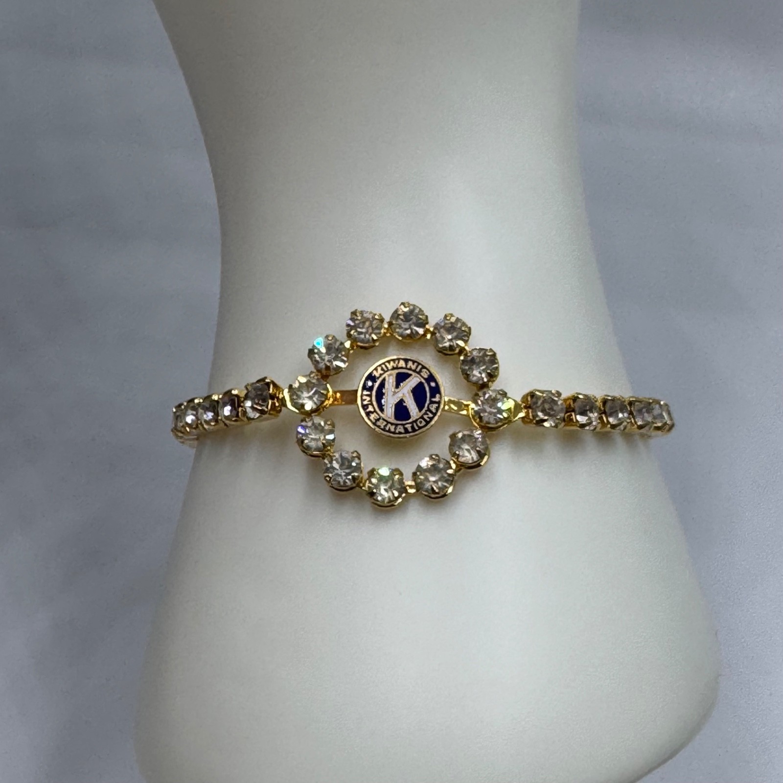 Vintage Kiwanis International Gold Tone Rhinestone Bracelet Blue Enamel Logo Vintage Kiwanis International Gold Tone Rhinestone Bracelet Blue Enamel Logo