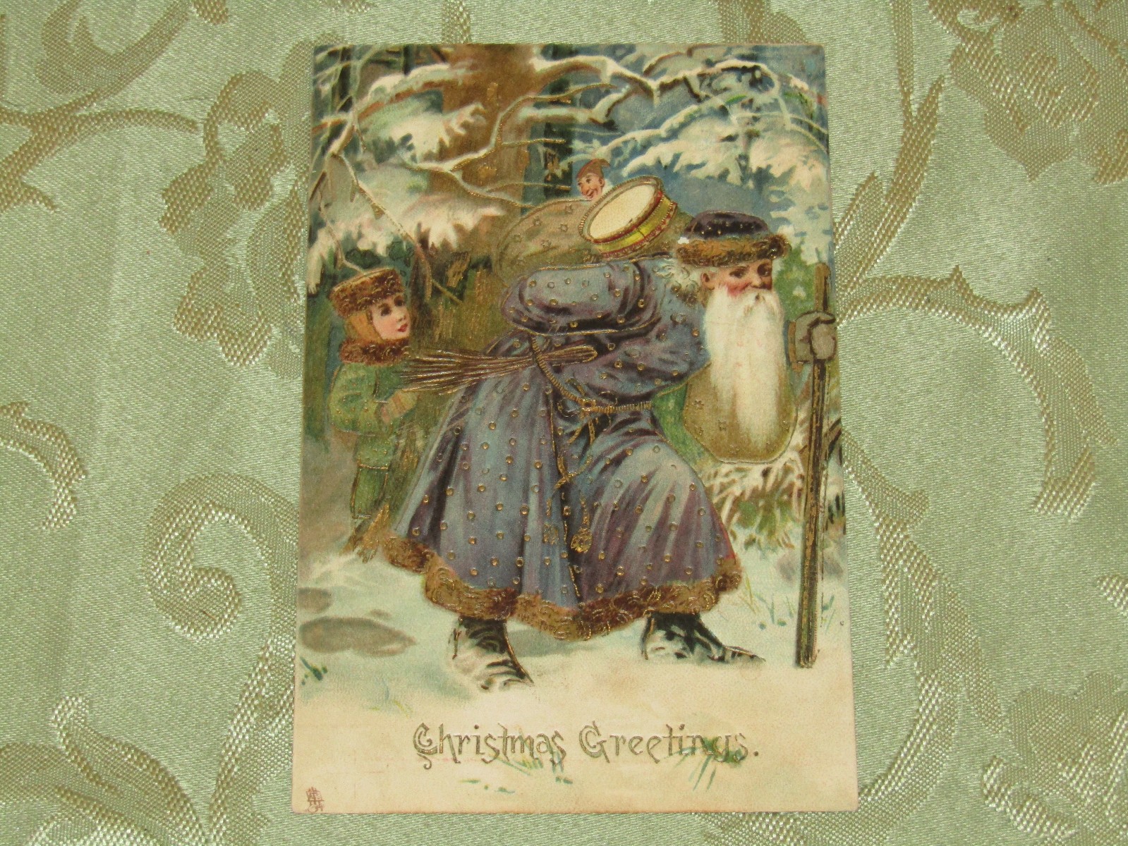 Antique *Purple Coat Santa/ Boy in woods / Gold Highlights* Tuck's 1908 PC
