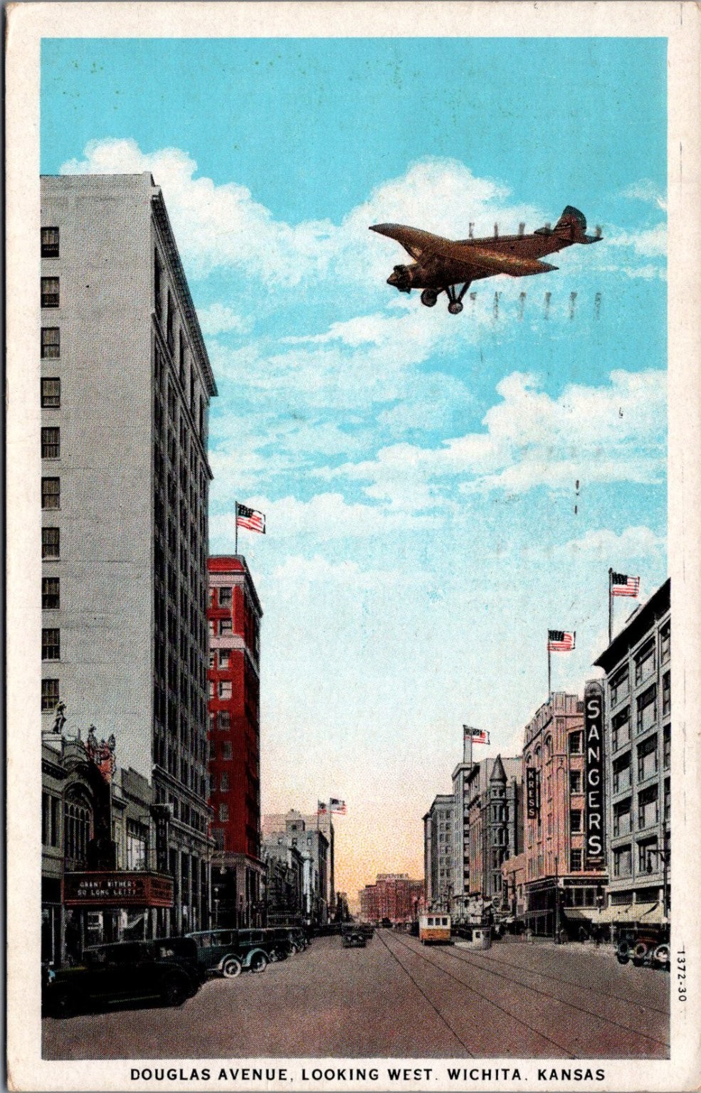 Wichita Kansas 1930 Douglas Ave Airplane Dropping Objects Streetcar Postcard Wichita Kansas 1930 Douglas Ave Airplane Dropping Objects Streetcar Postcard
