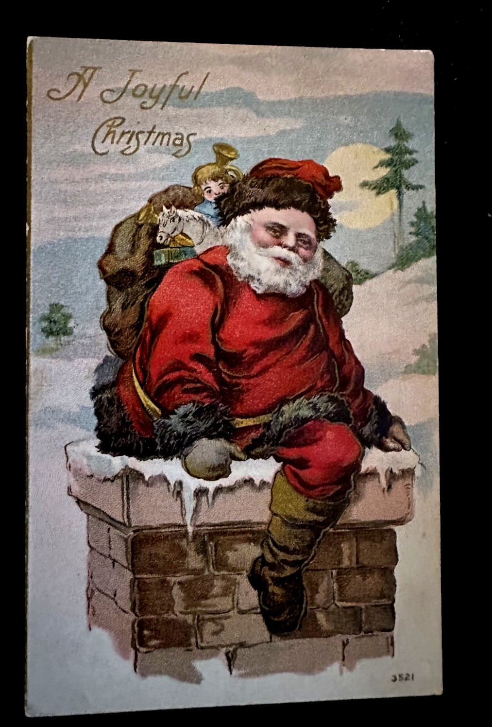 Santa Claus on Snowy Roof in Chimney with Gifts~Antique Christmas Postcard~s921