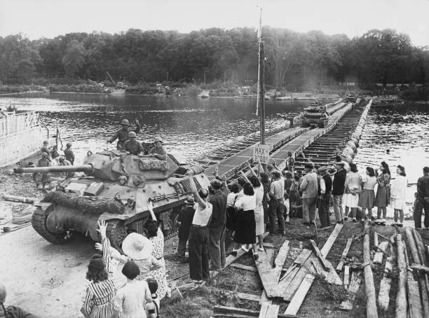 French civilians wave as 3 inch gun motor carriage M10 tank destro- Old Photo