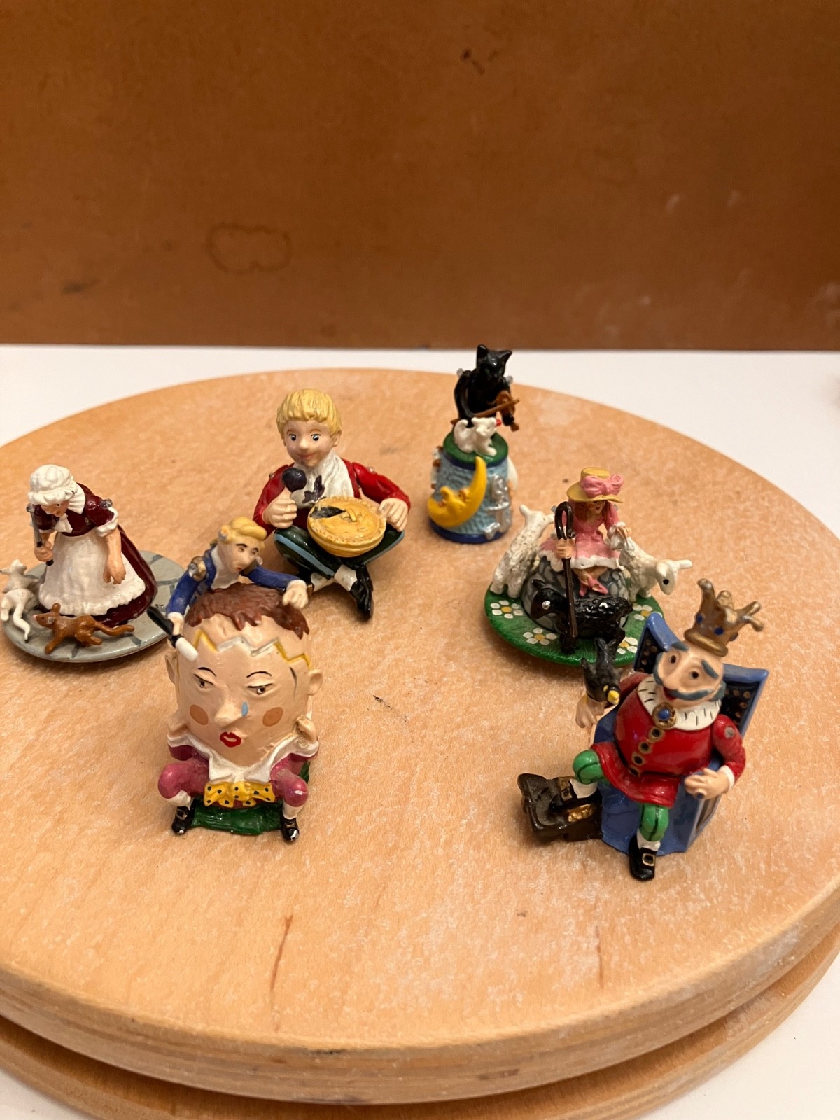 six metal thimbles, each a different nursary rhyme most with moving parts six metal thimbles, each a different nursary rhyme most with moving parts