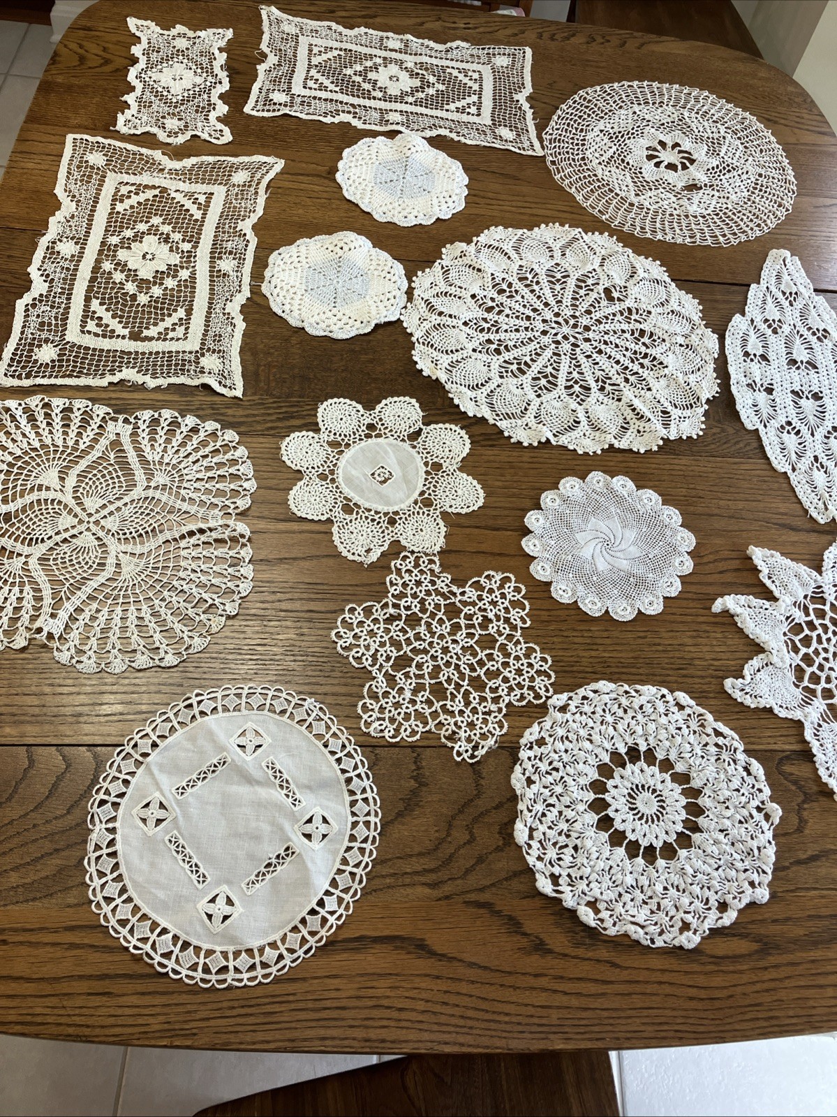 Lot Of 15 White Vintage Hand Crocheted Doilies In Various Shapes. And Sizes