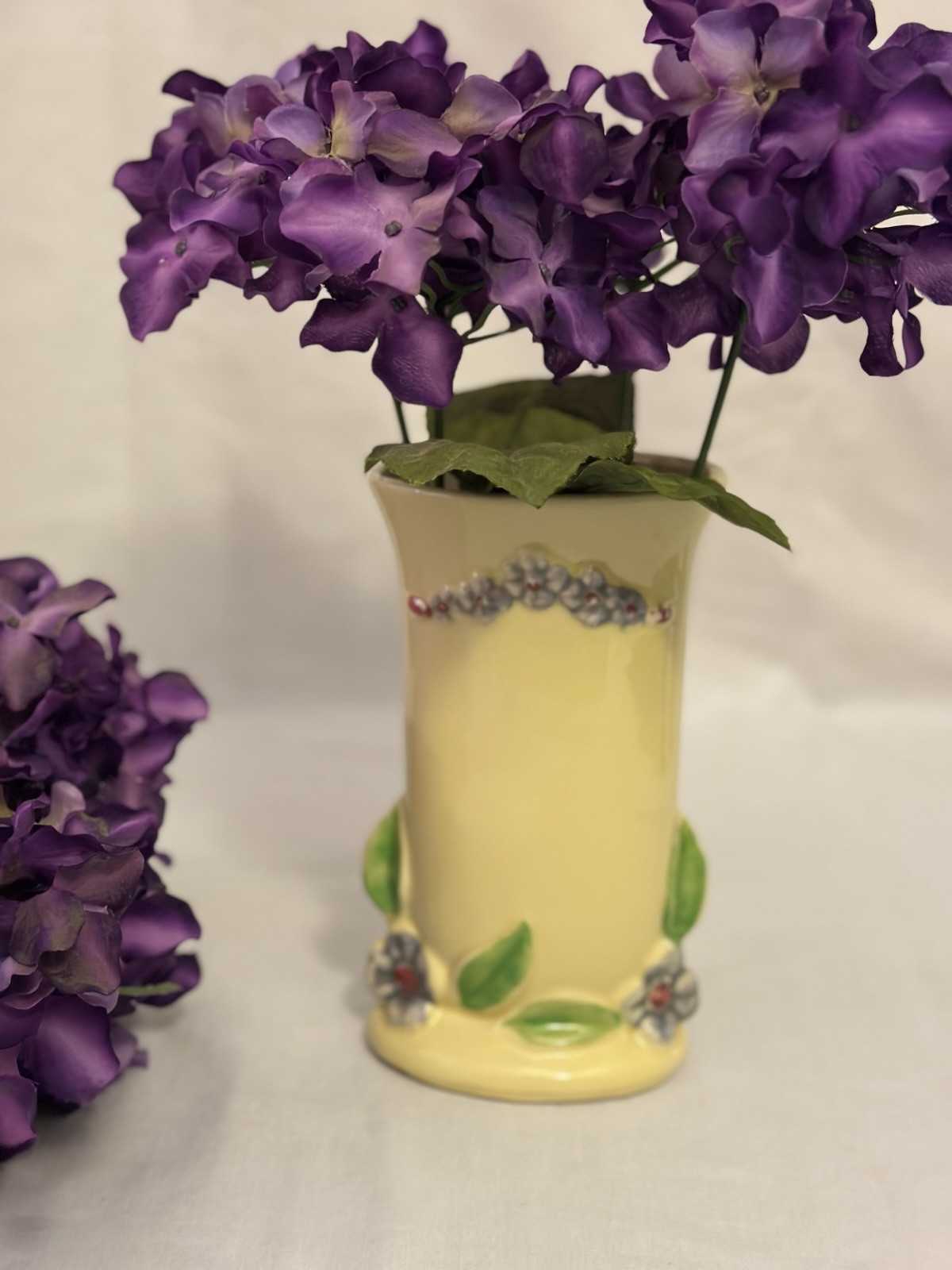 Vintage USA Ceramic Vase Purple Flowers With Green Leaves Glazed Pottery 7.5” Vintage USA Ceramic Vase Purple Flowers With Green Leaves Glazed Pottery 7.5”