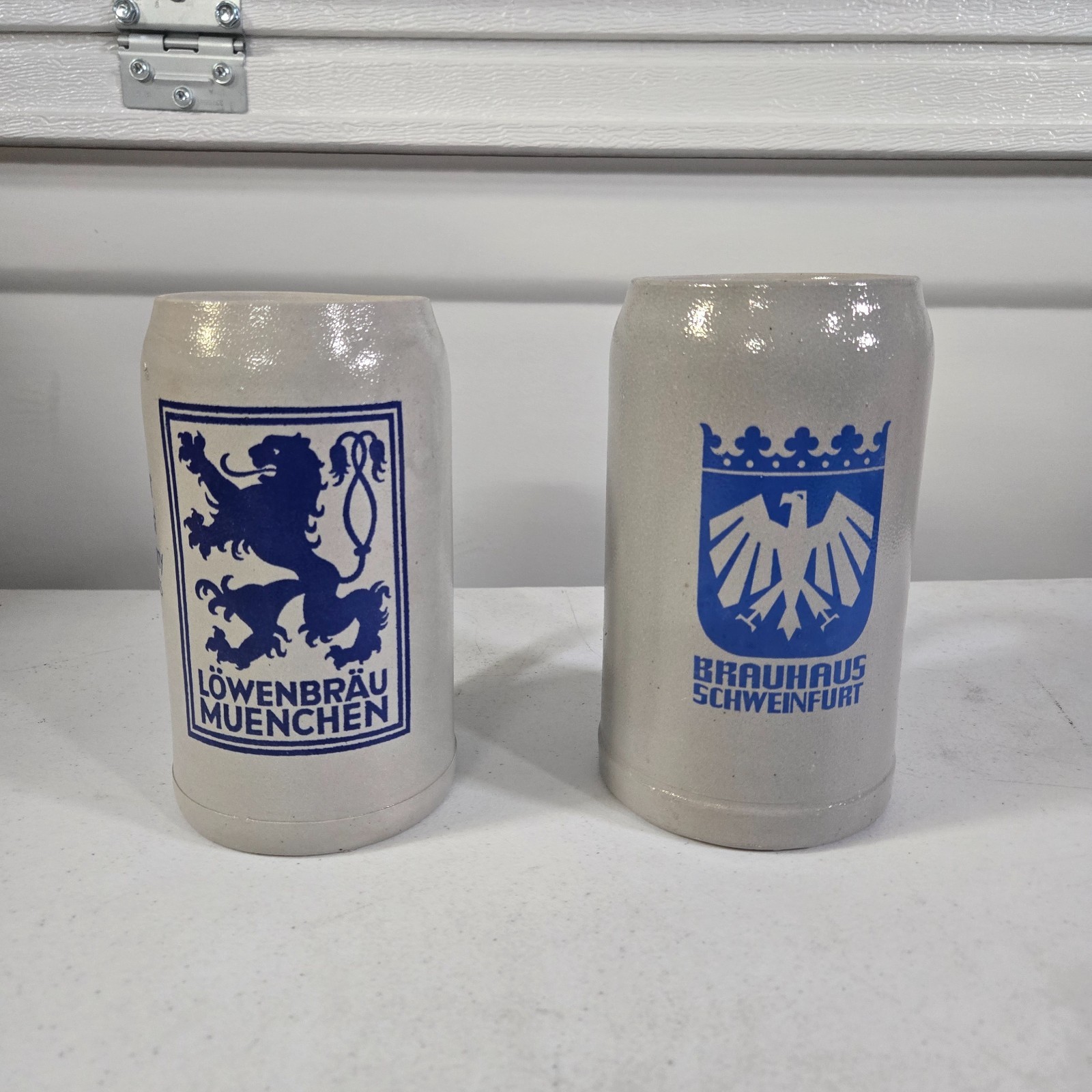 Vintage German Stoneware Beer Stein Lot of 2 Lowenbrau Brauhaus Schweinfurt 1L Vintage German Stoneware Beer Stein Lot of 2 Lowenbrau Brauhaus Schweinfurt 1L