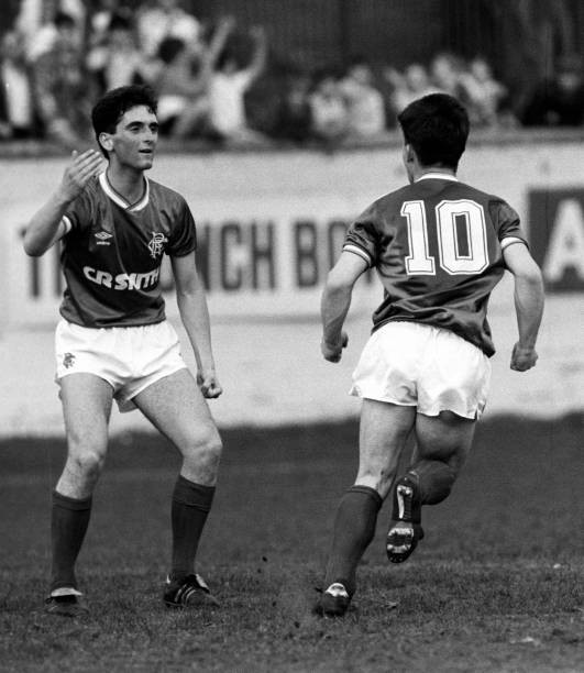 John Spencer celebrates with team-mate Jim Milligan after equalisi- Old Photo