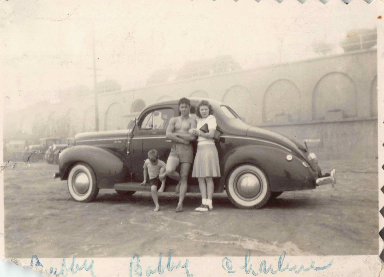 1940 Ford Deluxe Coupe 1940s Photo Young Shirtless Man Woman Beach Whitewalls