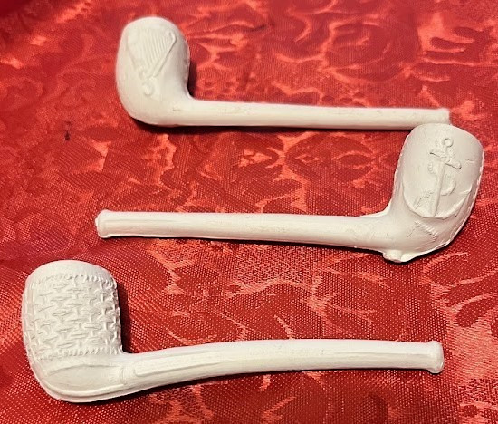 3 WHITE CLAY TOBACCO PIPES MOLDED RELIEF DECORATIONS 3 WHITE CLAY TOBACCO PIPES MOLDED RELIEF DECORATIONS