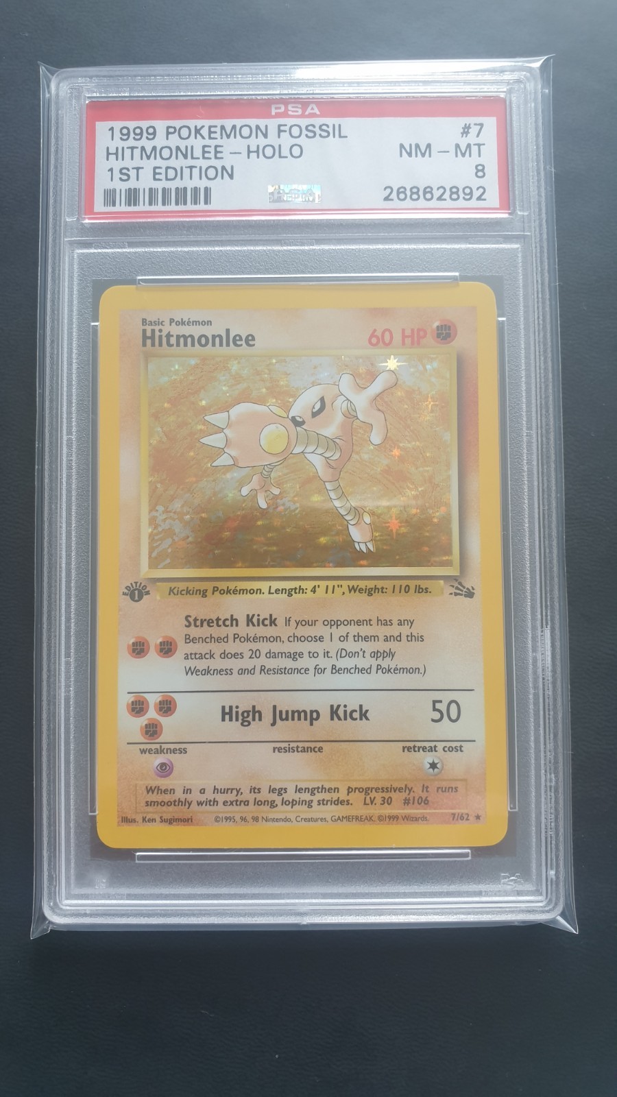 POKEMON CARD 1999 FOSSIL HITMONLEE HOLO 1ST EDITION #7 GRADED PSA 8