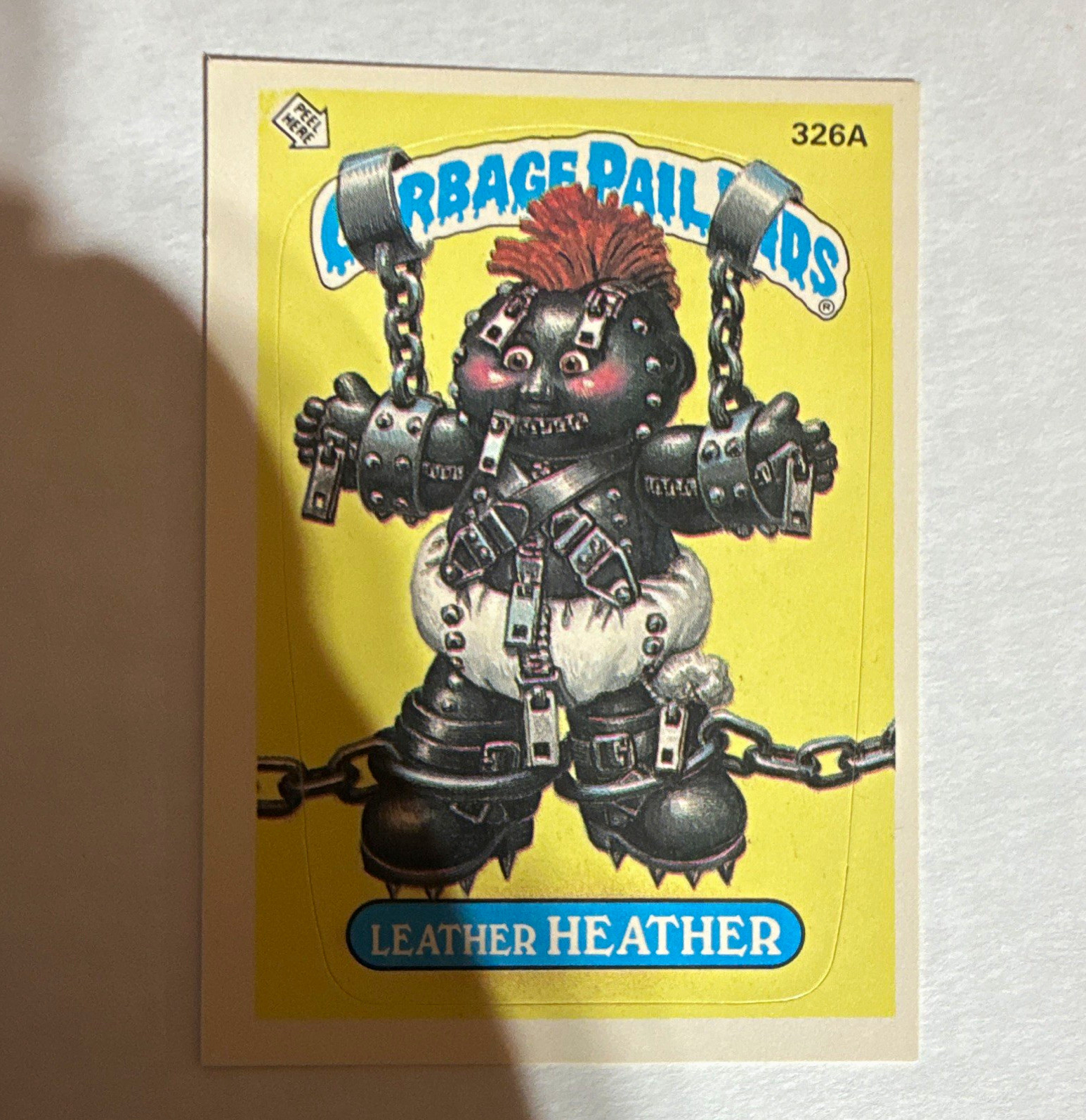 Topps 1987 Garbage Pail Kids #326A Leather Heather Sticker Trading Card