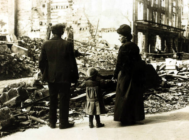 French civilians return to street to find their home now reduced t- Old Photo