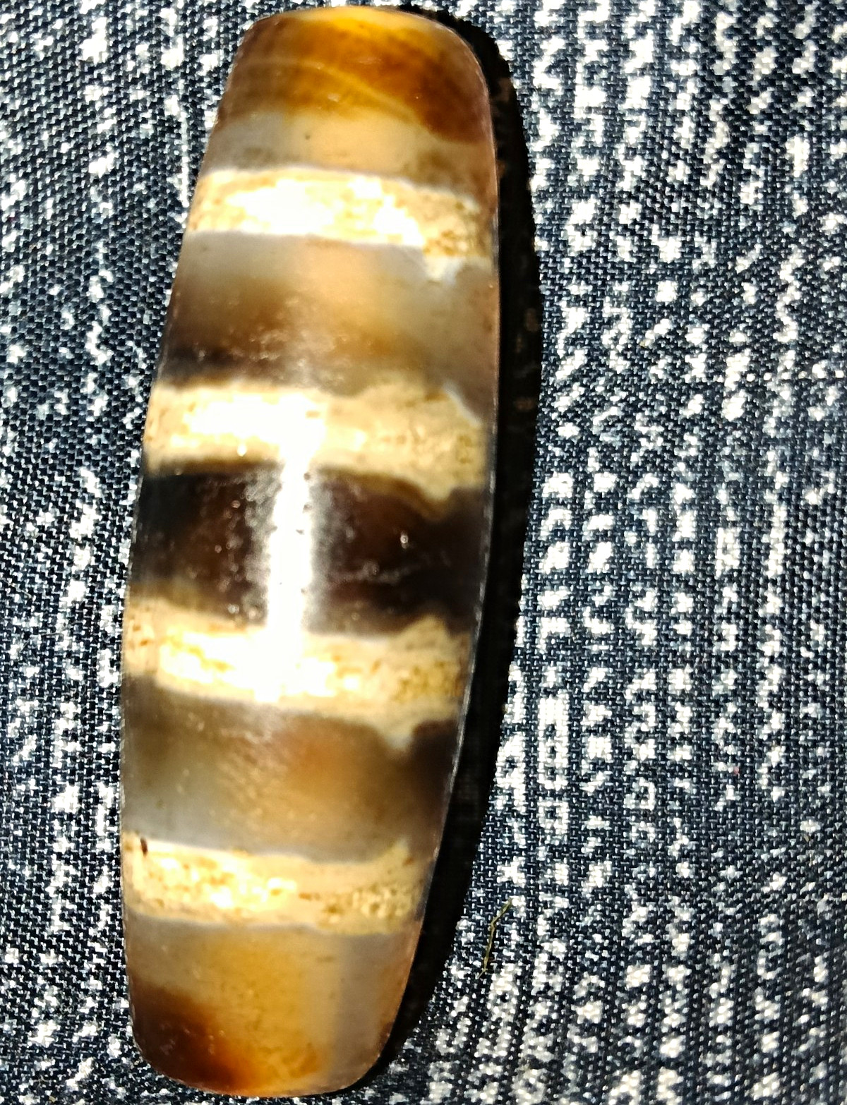 Pre-1800s Indo/Tibetan Old Agate Stripes Dzi Bead 44*14mm 14.3 grams Pre-1800s Indo/Tibetan Old Agate Stripes Dzi Bead 44*14mm 14.3 grams