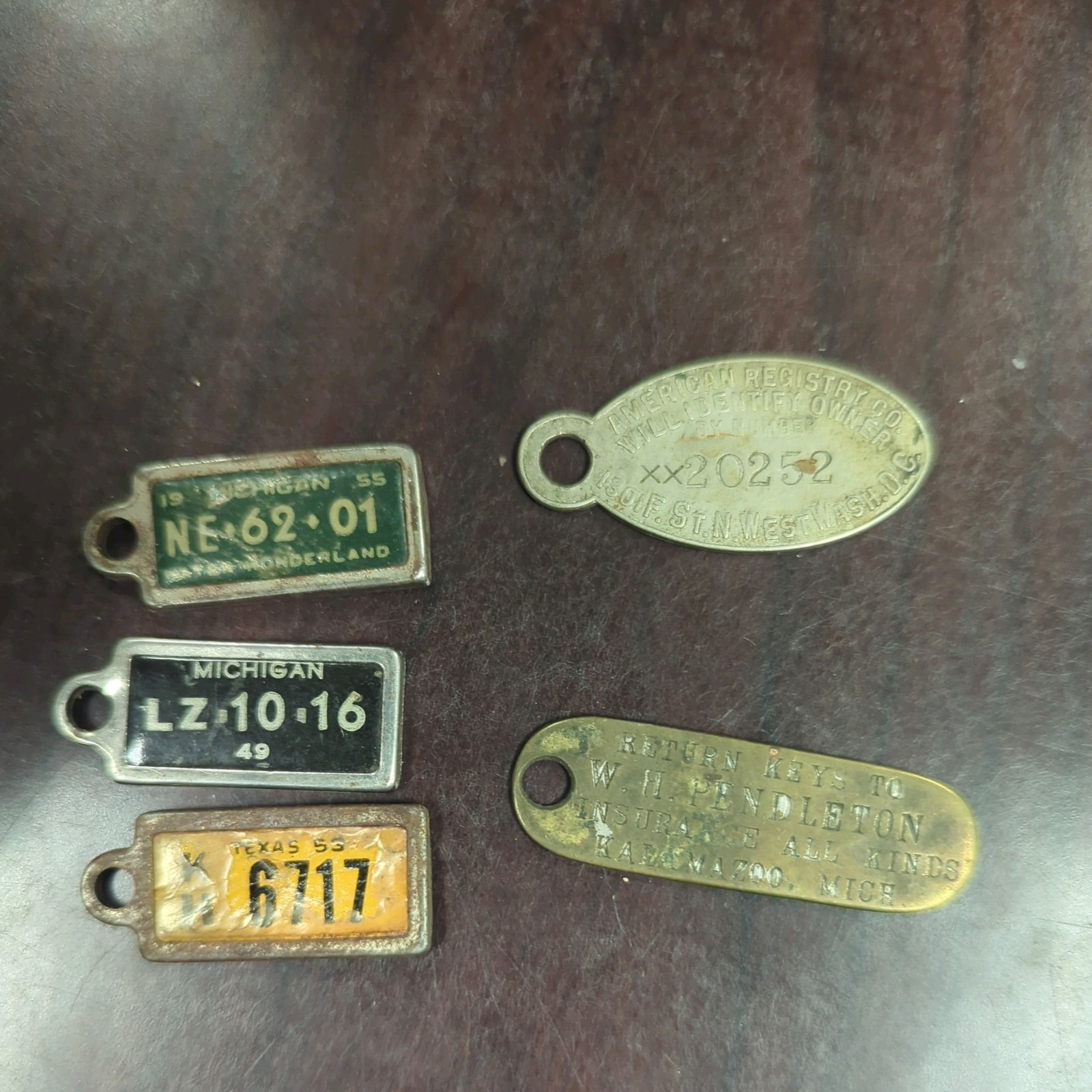Vtg michigan and texas Disabled American Veterans License Plate Key Chain Tags Vtg michigan and texas Disabled American Veterans License Plate Key Chain Tags