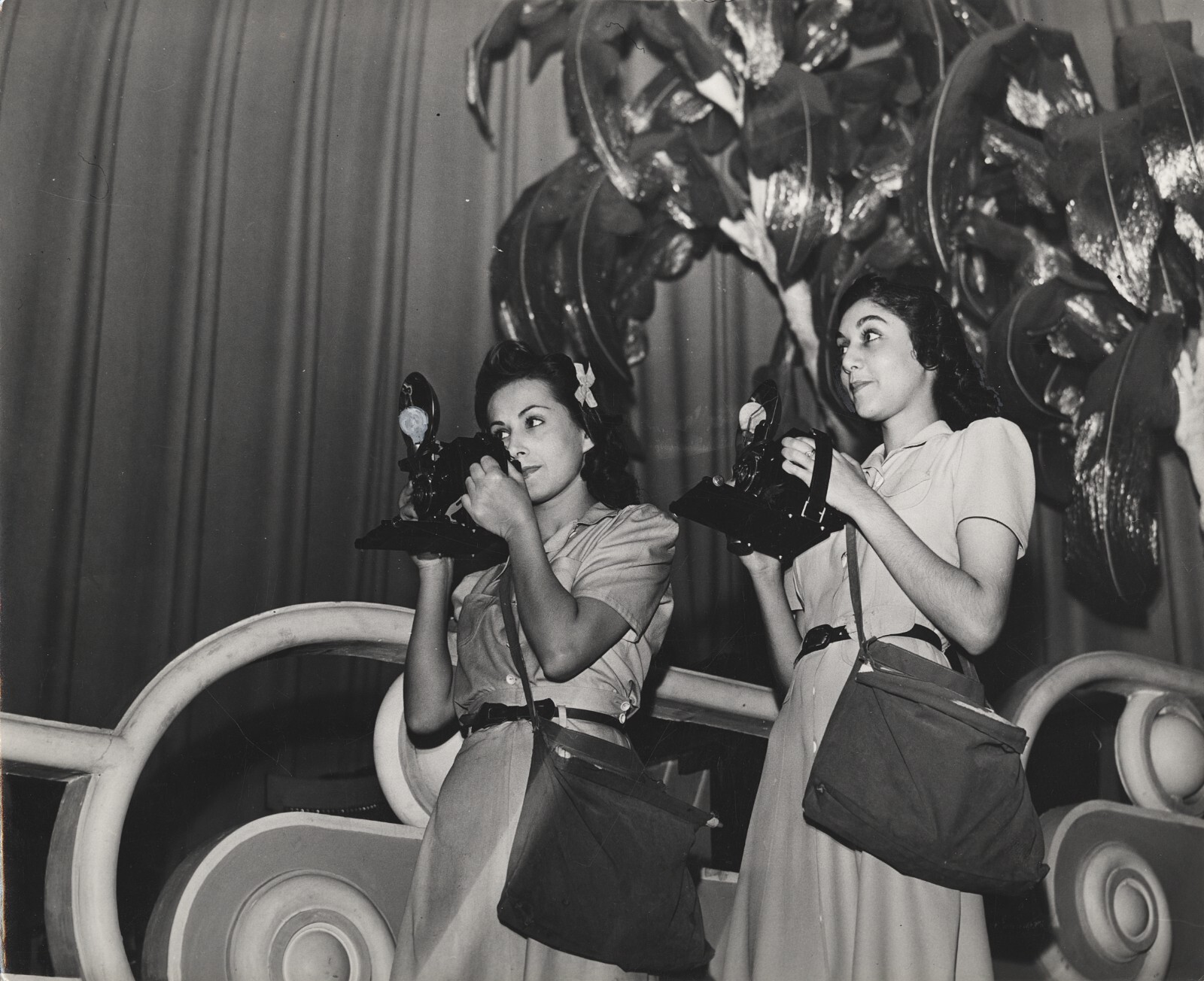 c. 1950\'s Two Female Photographers Taking Pictures with Flash Cameras Photo