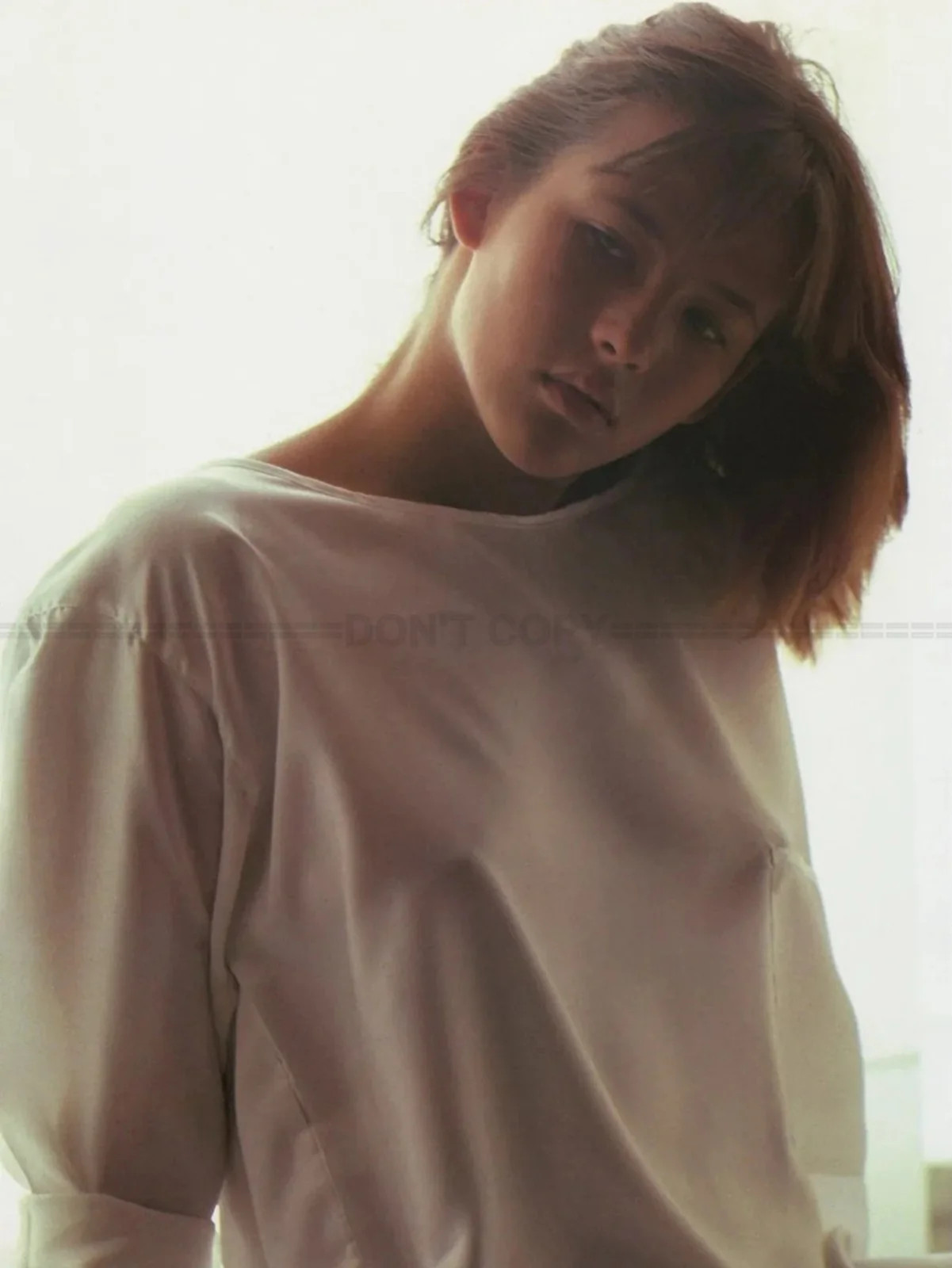 Photo Sophie Marceau in white blouse with boat neck, \