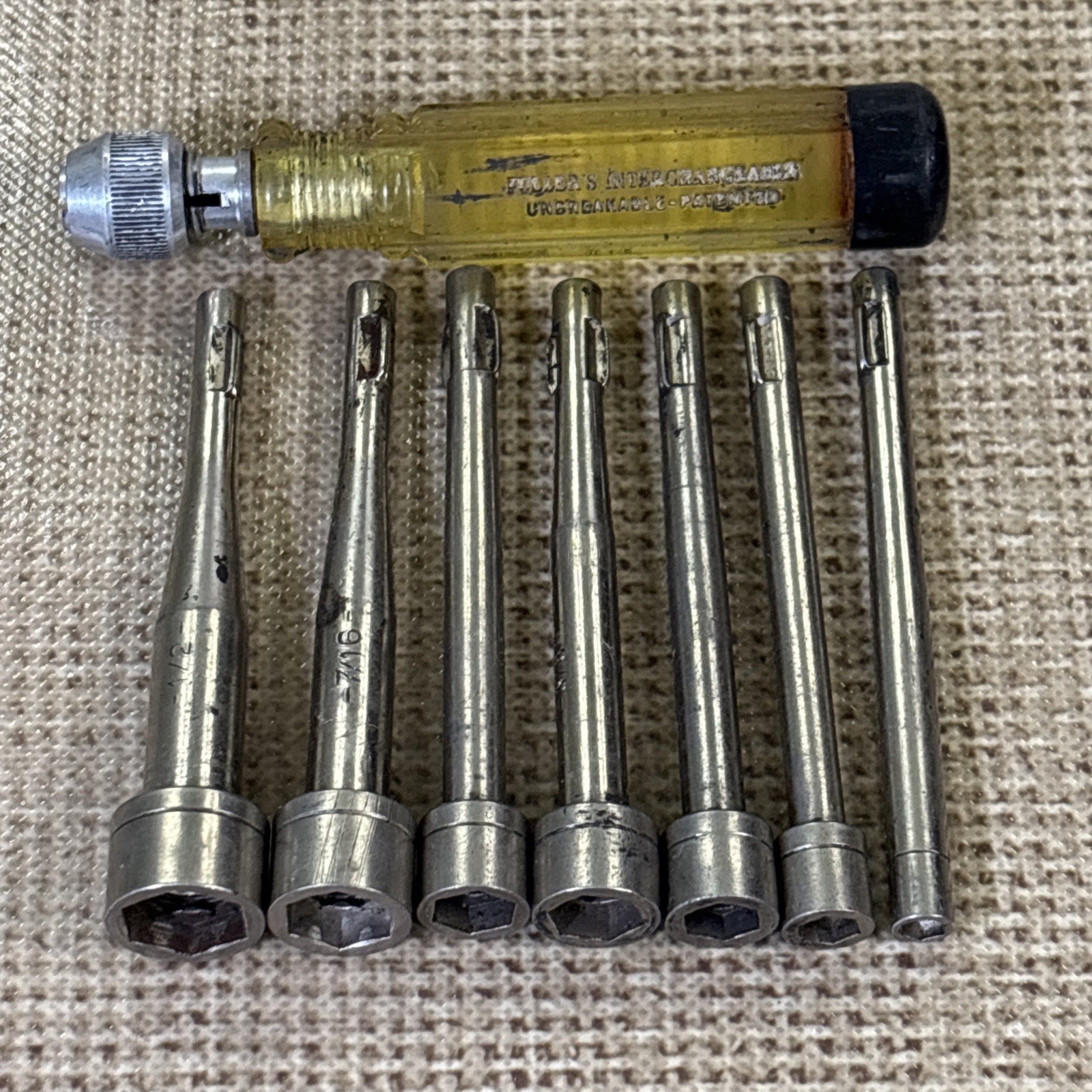Vintage Fuller’s 8-Piece Interchangeable Unbreakable Nut Driver Set 3/16”–1/2”.