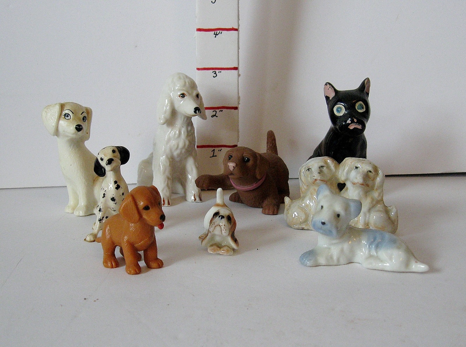 9 Pc Lot Miniature Dog Figurines Resin, Porcelain, Rubber, China, etc.
