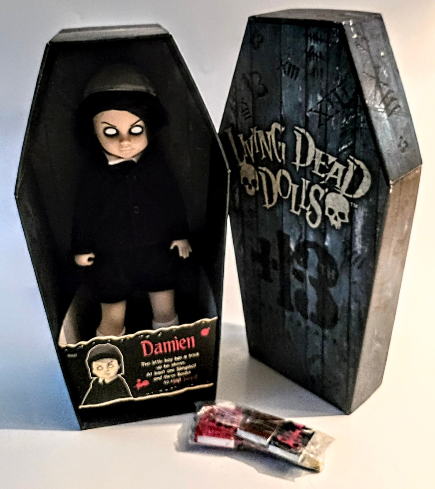 2011 Mezco Living Dead Doll Damien -Coffin & Death Certificate Included 2011 Mezco Living Dead Doll Damien -Coffin & Death Certificate Included