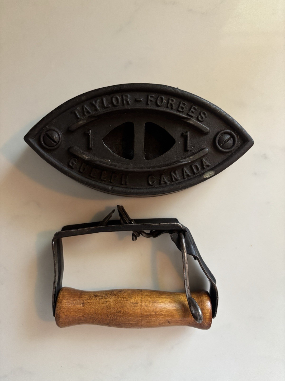 Vintage Taylor-Forbes No. 1 sad iron made in Guelph, Ontario, Canada. Vintage Taylor-Forbes No. 1 sad iron made in Guelph, Ontario, Canada.
