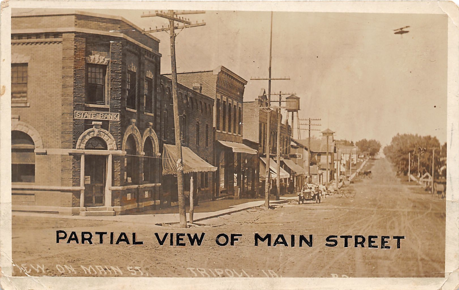 H47/ Tripoli Iowa RPPC Postcard c1910 Main Street Stores Bank Automobile H47/ Tripoli Iowa RPPC Postcard c1910 Main Street Stores Bank Automobile