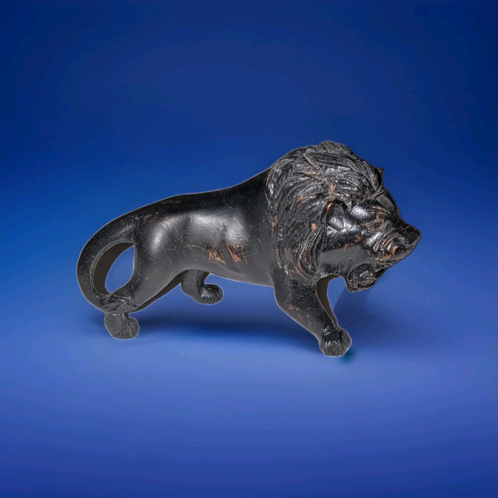 Vintage African Safari Hand Carved One Piece Ebony Wood Lion Mid 20th Century Vintage African Safari Hand Carved One Piece Ebony Wood Lion Mid 20th Century