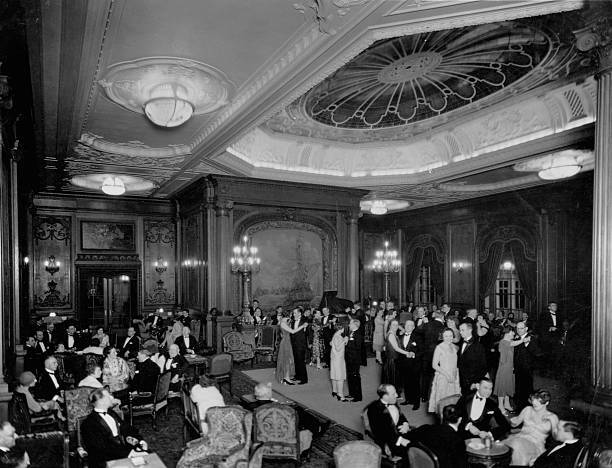 Large group elegantly dressed couples dance & share casual con- 1920 Old Photo