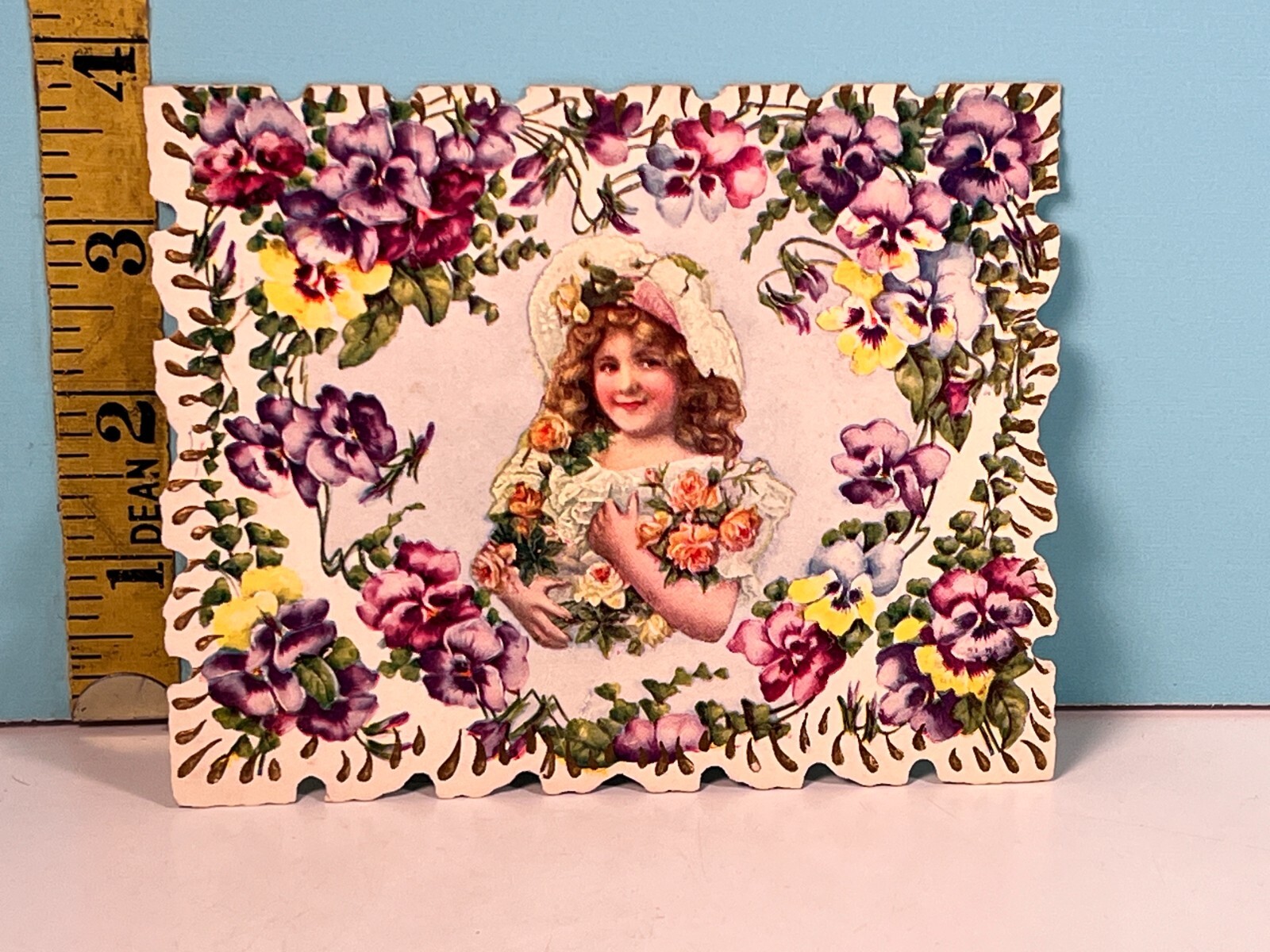 Vintage Embossed Friendship young girl surrounded in flowers