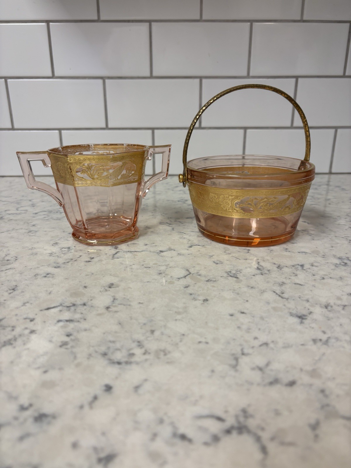 VTG 1930s pink depression glass sugar and cream pail set with gilt etched bands. VTG 1930s pink depression glass sugar and cream pail set with gilt etched bands.