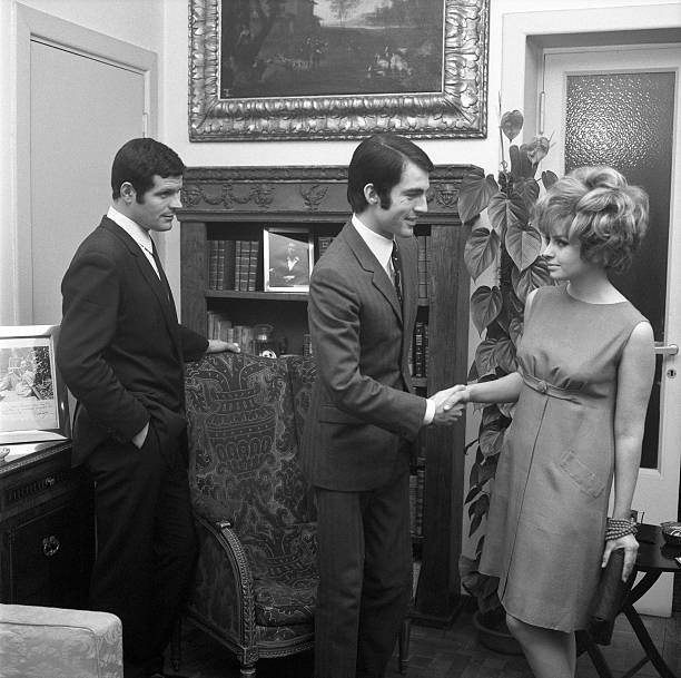 Young man shaking hands with a young woman Italy 1960s Historic 1960s Old Photo