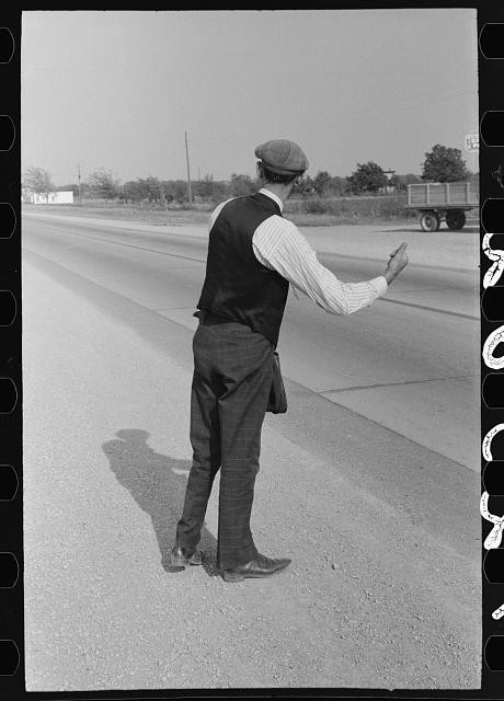 [Untitled photo, possibly related to: Hitchhiker at city limits of Waco, Texas]