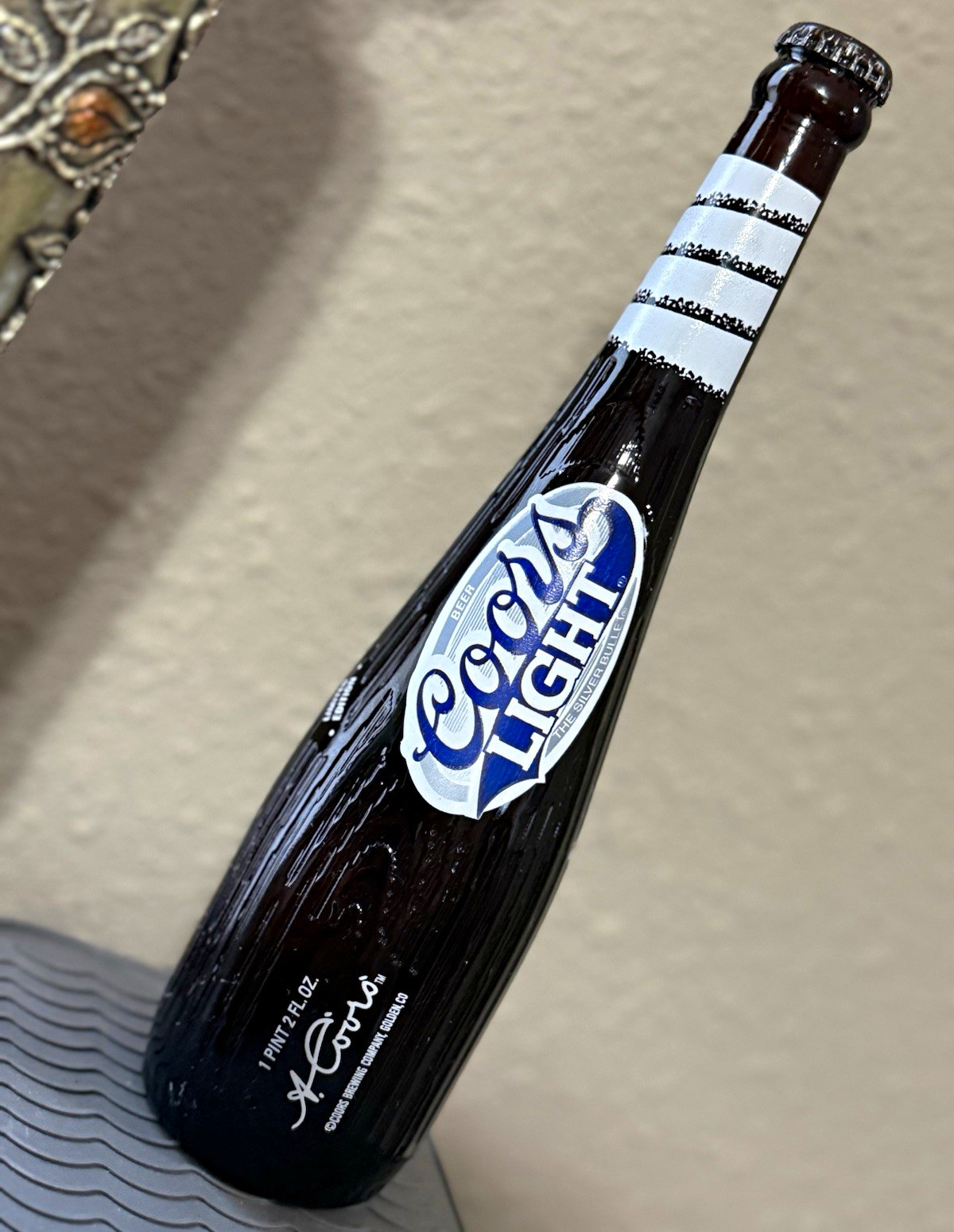 3 collectible limited-edition beer bottles.