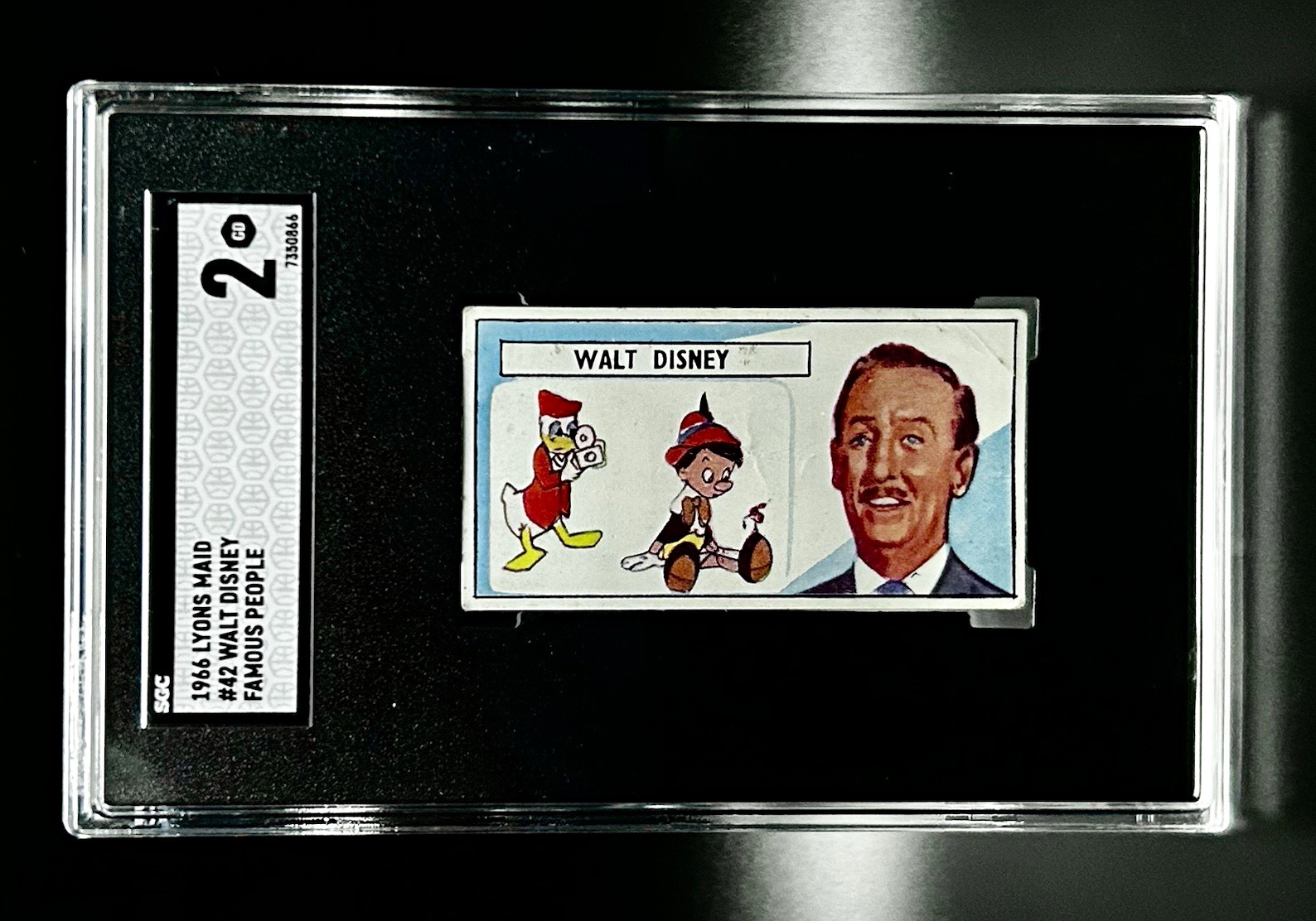 1966 Lyons Maid Famous People #42 Walt Disney Non-Sport Trading Card SGC 2 VT 1966 Lyons Maid Famous People #42 Walt Disney Non-Sport Trading Card SGC 2 VT
