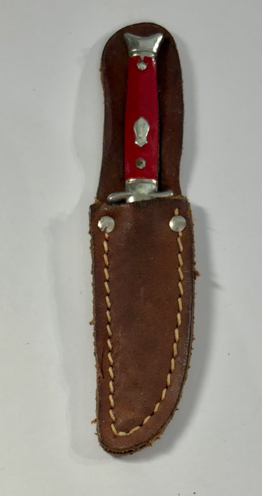 Vintage miniature fixed blade novelty red knife with leather sheath USA Vintage miniature fixed blade novelty red knife with leather sheath USA