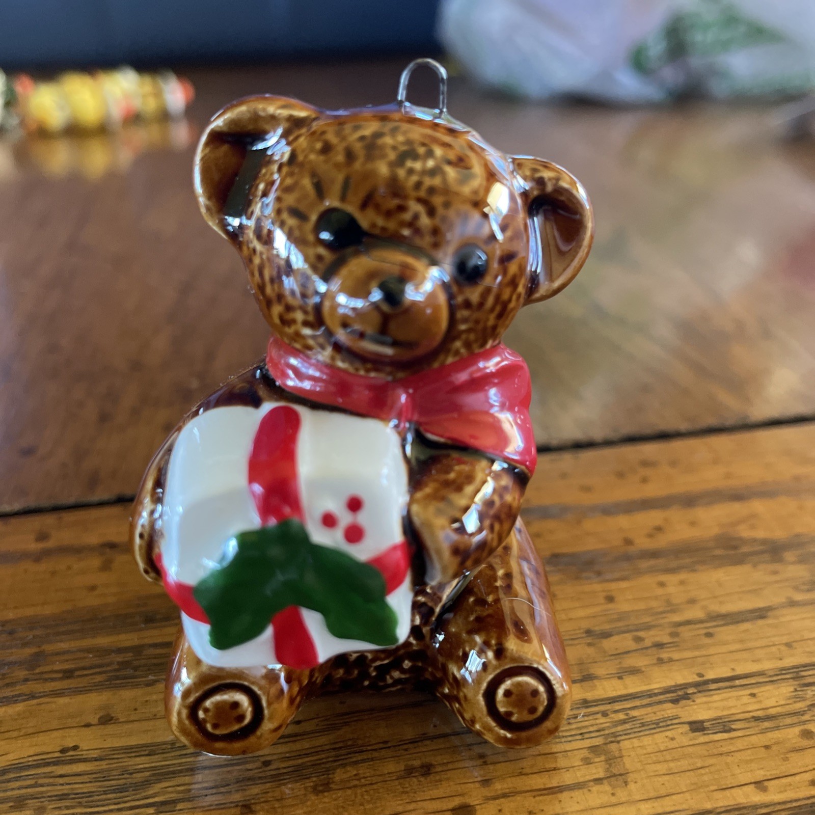 Vintage Schmid ceramic Teddy Bear holding a gift ornament
